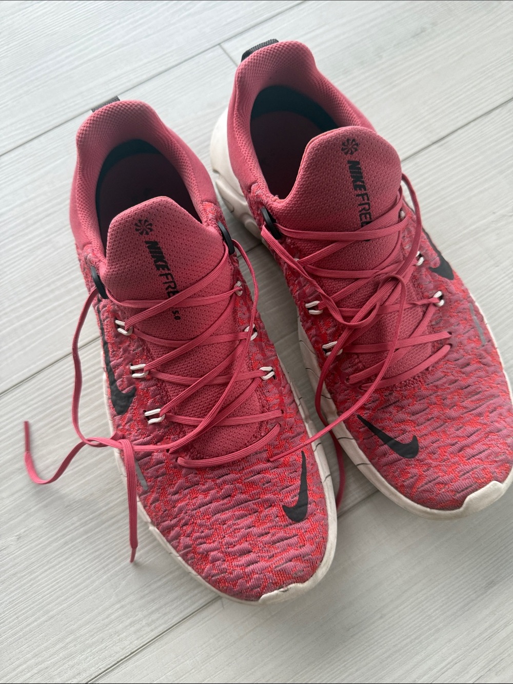 Nike Men’s Pink and Black Flyknit Running Shoes